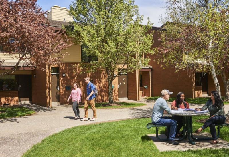 Behrend Apartments Exterior with students walking