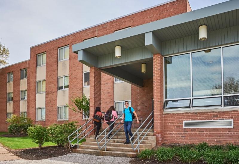 Niagra Hall Exterior with students walking into entrance