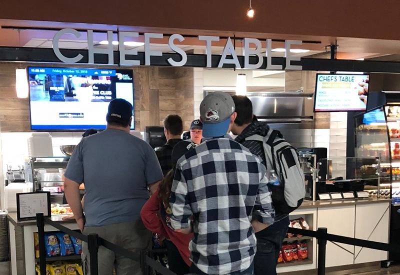 Students standing in line at Chefs Table Counter