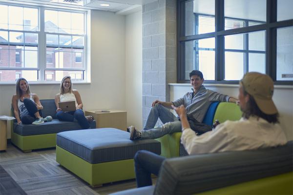 Students hanging out in Nittany Village lobby