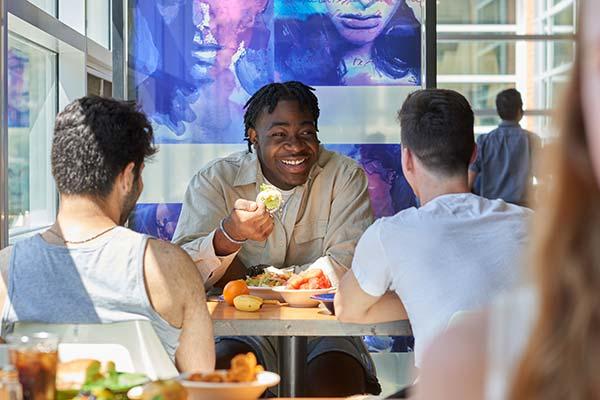 Students eating lunch at Pollock Commons