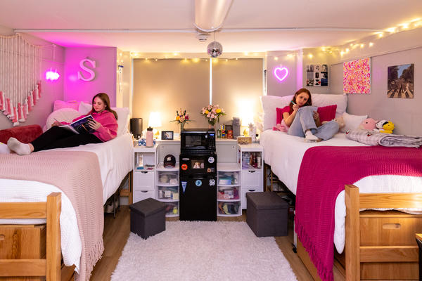 Interior, residence hall room, roommates studying