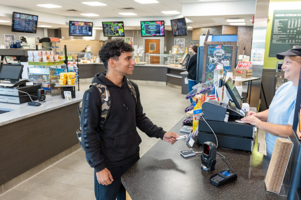 Student at cashier station