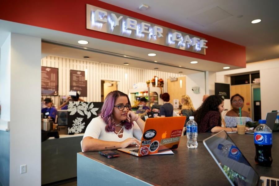 Cyber Cafe Interior with Students studying