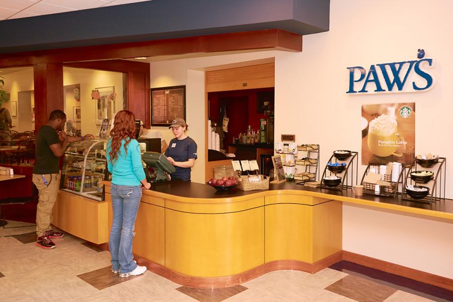 Student ordering yummy beverage at Paw's Coffee Shop