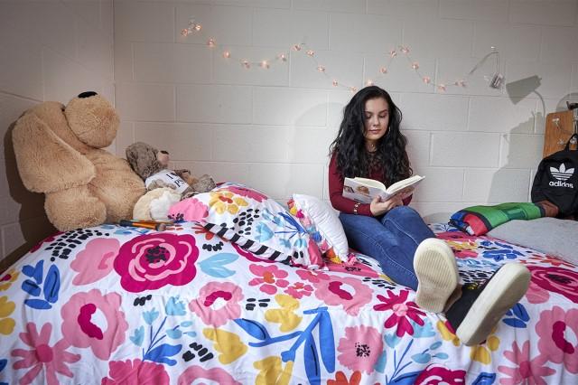 Juniata double with student reading