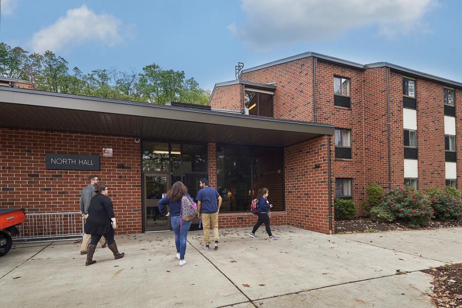 North Halls main entrance with students walking