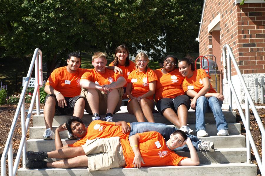 Welcome Week leaders resting on steps