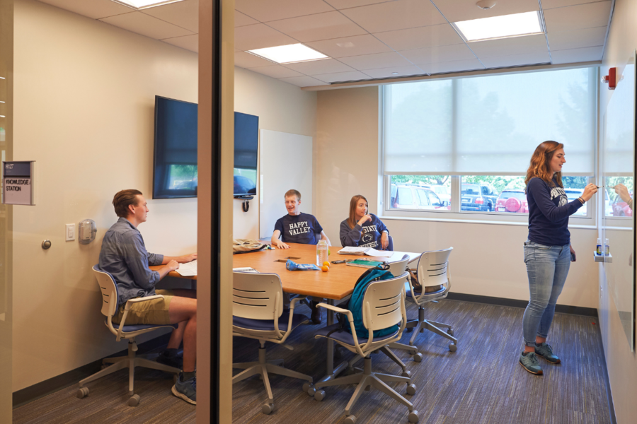 students in a study room working on a project