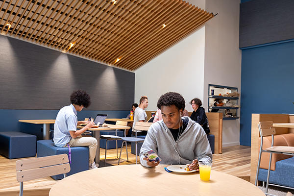 Students eating in the Tully's dining room