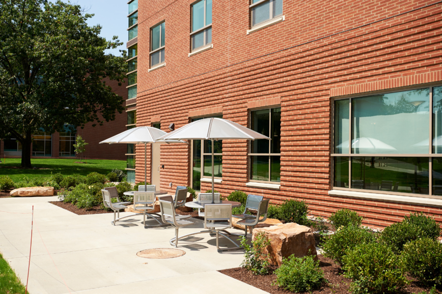 Robinson Hall outside patio area with table and chairs