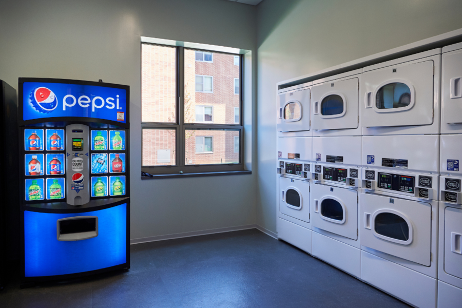 Robinson Hall laundry room showing dryers and vending machine