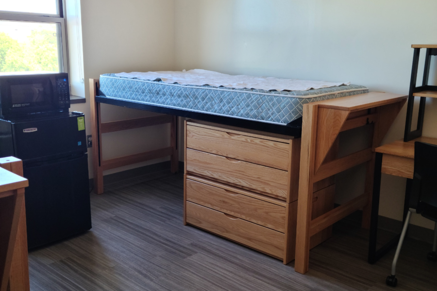 Robinson Hall room showing bed with dresser underneath