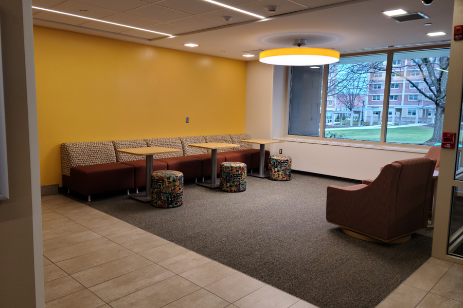 Hastings common area lounge with chairs and small tables