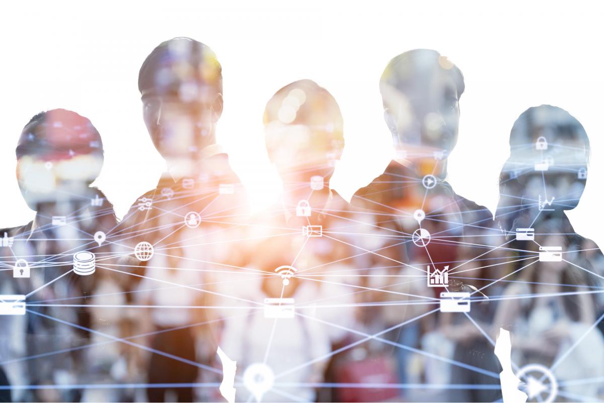 silhouettes of five people with business and scientific icons overlay
