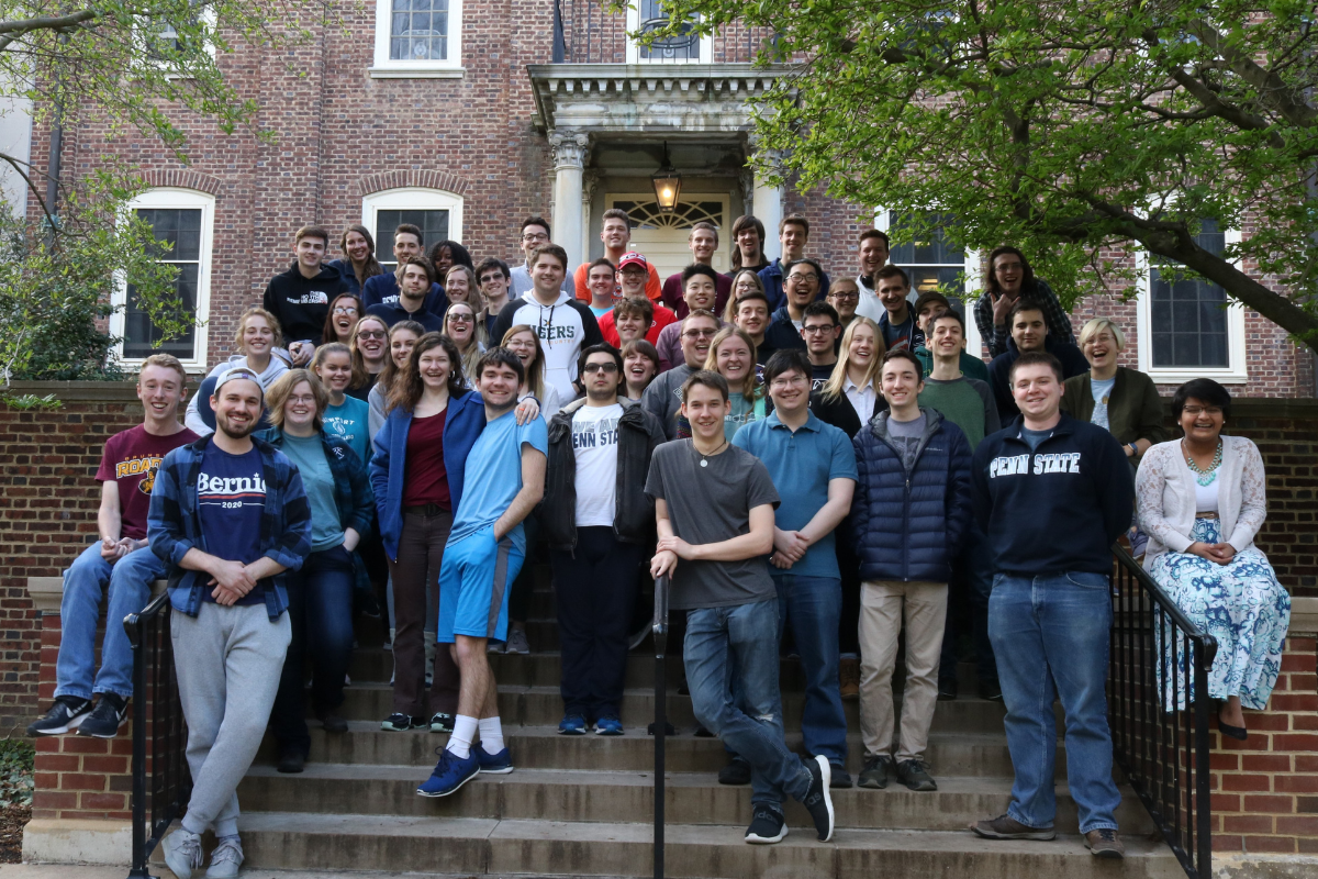 EMS House students group of students standing outside of residence hall