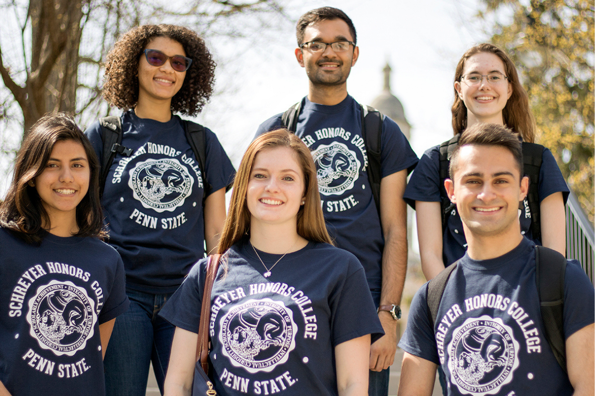Schreyer Honors College group of students standing outside of residence hall