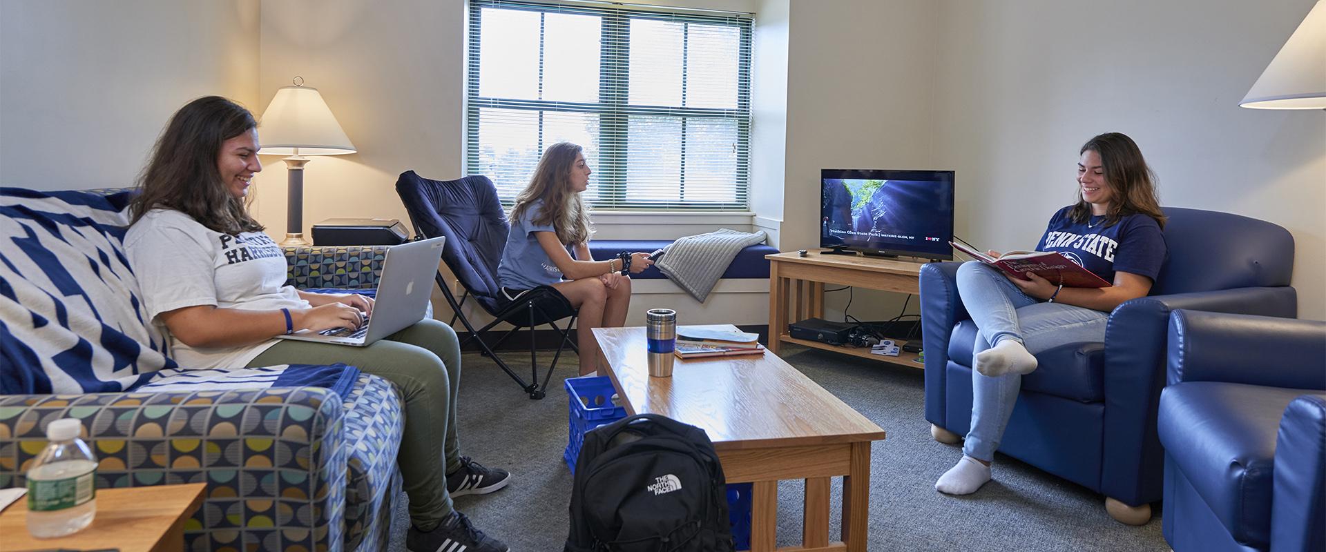 Students hanging out in their Capital Village living area