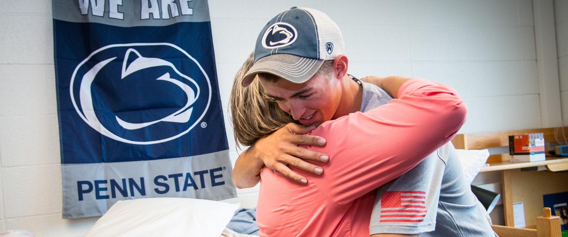Photo of Jordan A. hugging mom, Dulcie