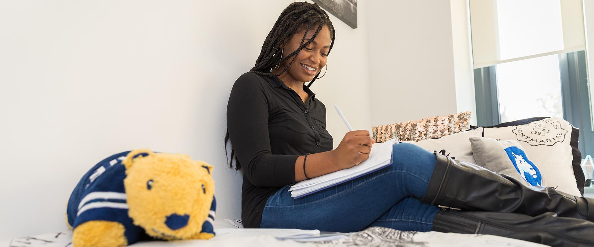 Student in Orchard Hall Room